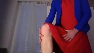 Young amateur cross dresser  in a red dress and blue blazer