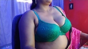 Desi girl opens her green bra and grabs boyfriend's cock.